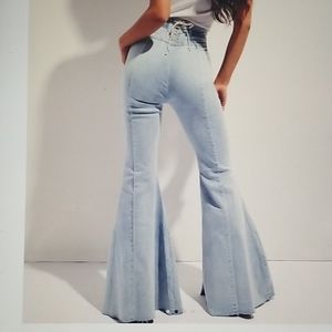 CRVY Super High-Rise Lace-Up Flare Jeans
